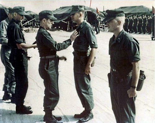 Marine Veteran Jack Lyon is awarded the Purple Heart Medal during the Vietnam War.