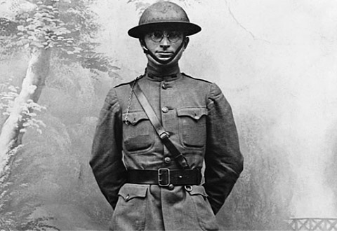 Black and white photo of Harry Truman in a military uniform