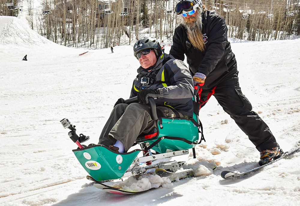 veterans participating in downhill skiing 