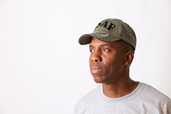 A man wearing an Air Force hat