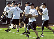 Disabled men practicing softball
