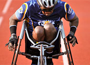 Vet in a wheelchair, racing on a track