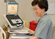 Nurse with medical laptop