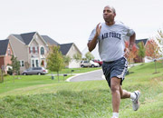 Man running in a neighborhood
