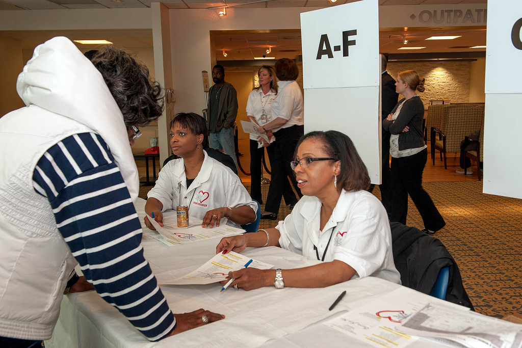 Volunteers register Veterans during the annual Winterhaven stand down event at the Washington D.C. VA Medical Center.