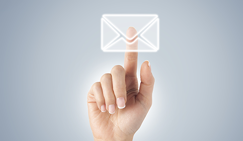 Hand/finger touching an email envelope