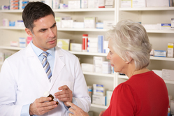 pharmacist talking to customer