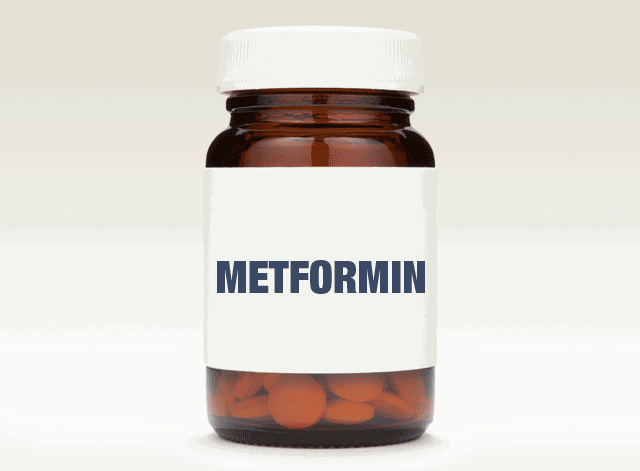 warning symbol flashing on a bottle of pills labeled Metformin