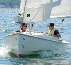 members of the Navy in a sailboat