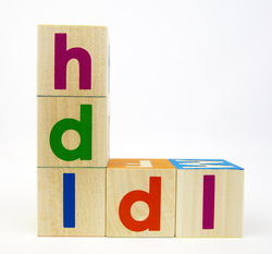 wooden blocks with letters spelling hdl and ldl