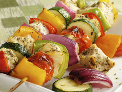 grilled chicken and vegetables on a skewer