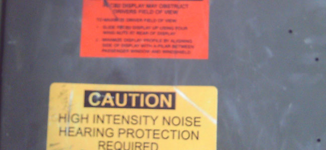 My other job title is truck driver, which is known as an 88-Mike. So, as you’re driving the truck, these are some of the signs that you’ll see. …these are basically warning signs for high-intensity noise. So, this is the second sign that you will see for hearing, whereas you need earplugs, and if you’re not doing it right it may not affect you that day …but then, five years later, you’ll be wondering why you can’t hear.