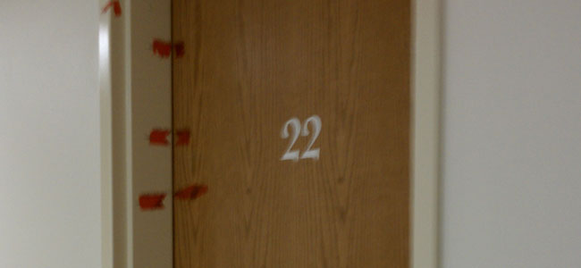 Back from our second deployment, we were away for training. My commander killed herself. That’s the room she was staying in; Room 22. She hung herself in the bathroom. She went through with it.