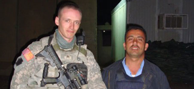 This is an Iraqi policeman, and me hanging out with him. I was pen pals with him, but he stopped writing me. He stopped writing me, so I don’t know what happened. I am kind of worried about him because these are the guys who are constantly getting killed, hurt, and maimed.