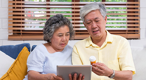couple looking at tablet together