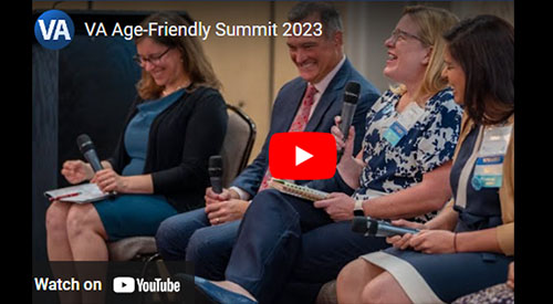 Group of four people laughing together during VA Age Friendly Summit