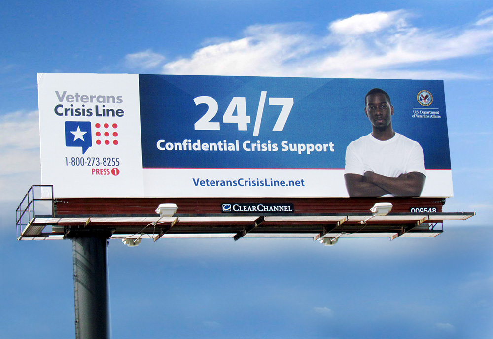 A roadside billboard for the Veterans Crisis Line