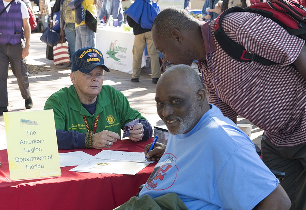 Dave Miller assists homeless Veterans and those at risk during a Stand Down for Homeless Veterans event at the C.W. Bill Young VA Medical Center