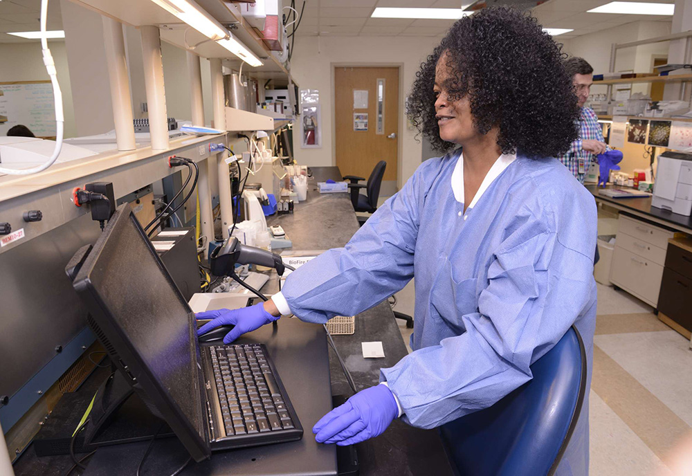 Medical Technologist Dionne Hockett operates the new BioFire Blood Culture Identification system 