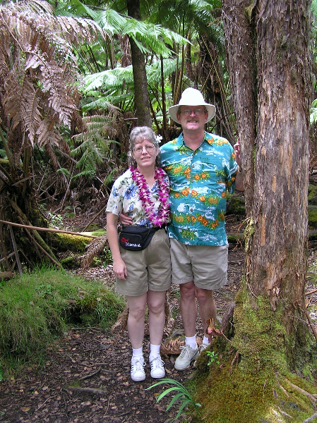 Rex Stevens standing by tree with wife