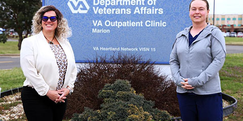 Pictured are nurse practitioners Elizabeth Hardy (left), and Carrie Staggs (right), standing in front of the VA Marion Outpatient Clinic