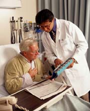 Doctor discussing patient's medical records with patient