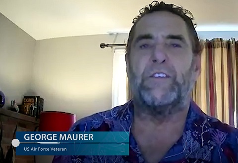 Man in blue shirt speaking to camera with name displayed George Maurer Air Force Veteran