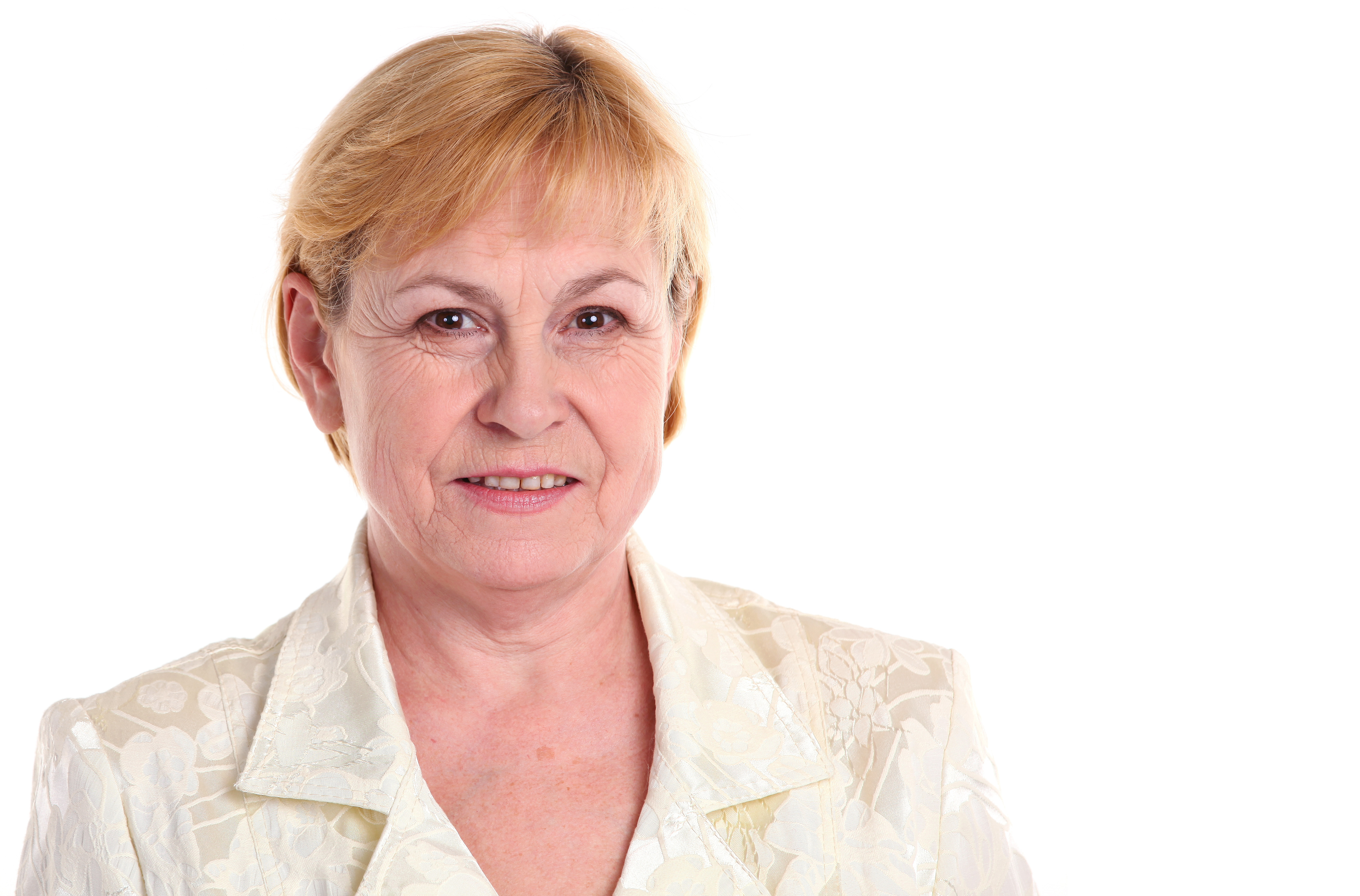 Portrait of mature woman against white background