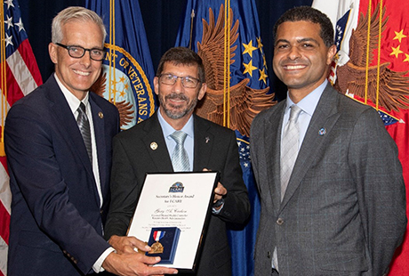 Pictured (left to right): VA Secretary Denis McDonough, Gary Carlson and Dr. Shereef Elnahal, Under Secretary for Health