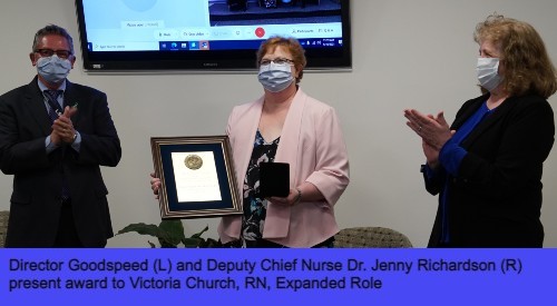 Director Goodspeed and Deputy Chief Nurse Richardson present award to Victoria Church