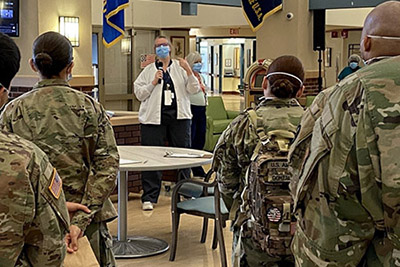 RNs Pyjas and Bailey teach class of national guard members