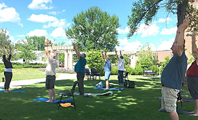Yoga class for Veterans in Fargo's healing garden