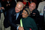 Vice President Joe Biden shaking hands with a woman in a wheelchair.