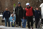 Deputy Secretary of Veterans Affairs, W. Scott Gould, and Sandy Trombetta walking toward a ski lift.