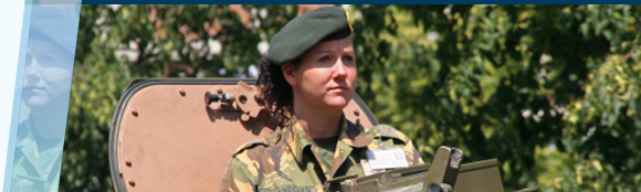 A strong female Soldier in a tank